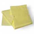 A pale yellow clendo staubbindetuch made of soft polypropylene folded neatly for dust removal