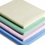 Stapel aus microfiber-reinigungstüchern floorstar microfaser-duettuch kappilar in pastellfarben creme, minzgrün, lavendel und hellblau