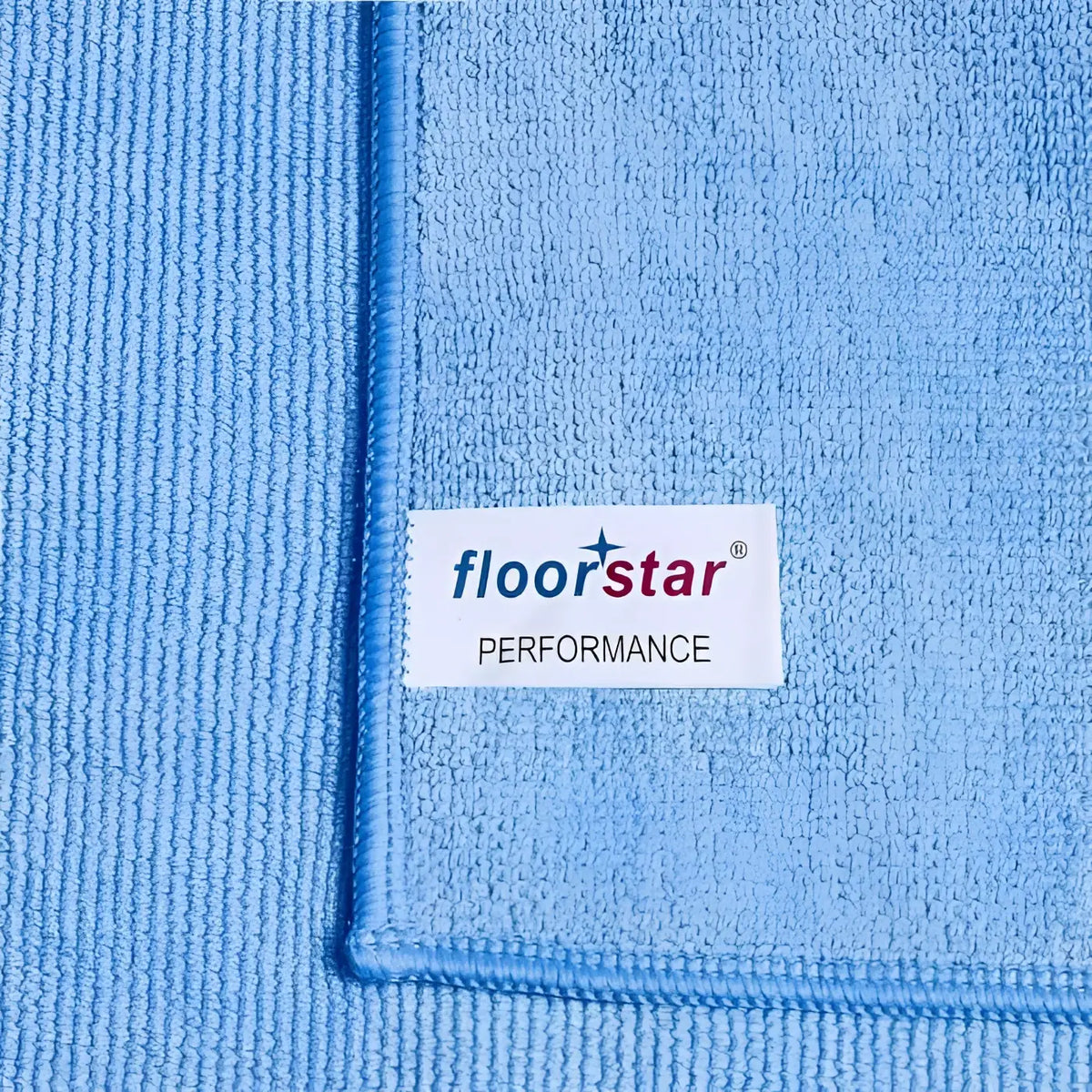 Lichtblaues floorstar mikrofasertuch premiumtuch performance mit weißem label für bodenreinigung
