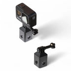 Schwarze gopro hero 8 actionkamera auf schwarzer gardiner kamerahalterung mit quick-loq aufnahme und verstellbarem arm montiert