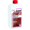 Weiße plastikflasche mit rotem verschluss und lila etikett moeller hmk 330 fliesenöl 1l zur pflege von cotto und klinker