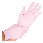 Rosa hygienische nitrilhandschuhe von hygostar safe light aus latex getragen an einer hand