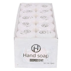 Weiße runde handseifenstücke mit hygostar logo in einer box hygienisch und hautschonend 50 stück