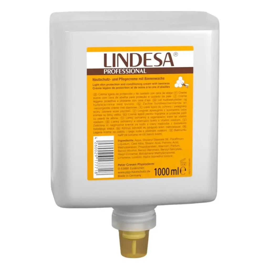 Weiße plastikspenderflasche mit gelb-braunem lindesa professional etikett für 1000ml hautschutzcreme