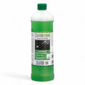 Grüne glasflasche mit grünem verschluss und weißem etikett mit konzentriertem fensterreinigungsmittel solution-glöckner greeN glanzwischpflege konzentrat