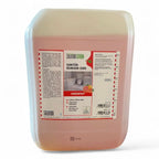 Ein durchsichtiger pinkfarbener kunststoffbehälter mit sanitärreiniger zero von solution green etikett in rot und grün