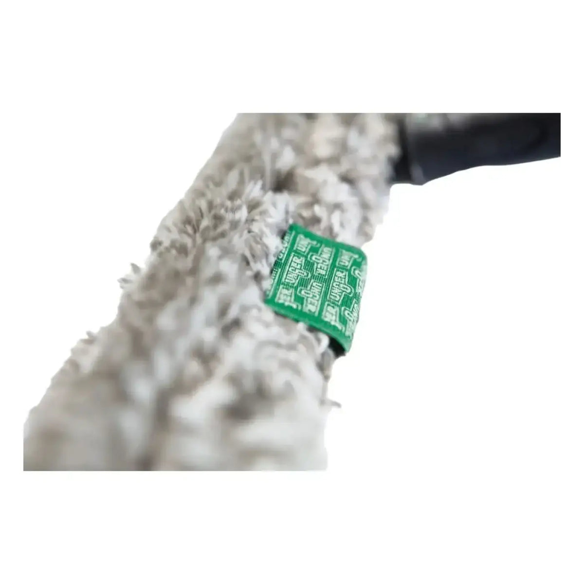A light gray microfiber mop head with green label for unger ergotec ninja einwascher-bezug nj