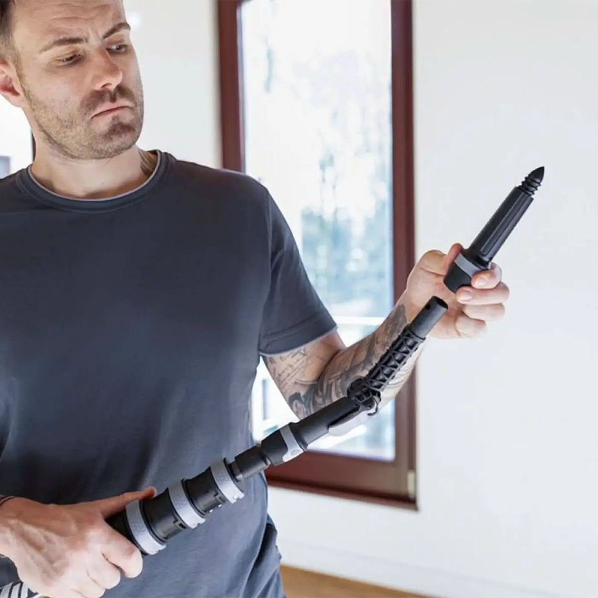 Schwarz-grauer segmentierter widerstandsbandstab mit verstellbaren gelenken ungerr ninja winkeladapter ncpan